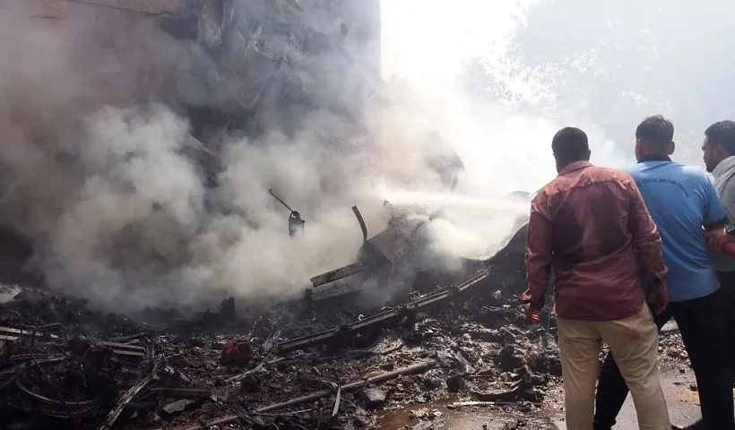 Firefighters work at the site where Air India flight 171 crashed in a residential area near the airport in Ahmedabad on June 12, 2025. The London-bound passenger plane crashed on June 12 in India's western city of Ahmedabad with 242 on board, aviation officials said in what the airline called a "tragic accident". (Photo by Sam PANTHAKY / AFP) (Photo by SAM PANTHAKY/AFP via Getty Images)