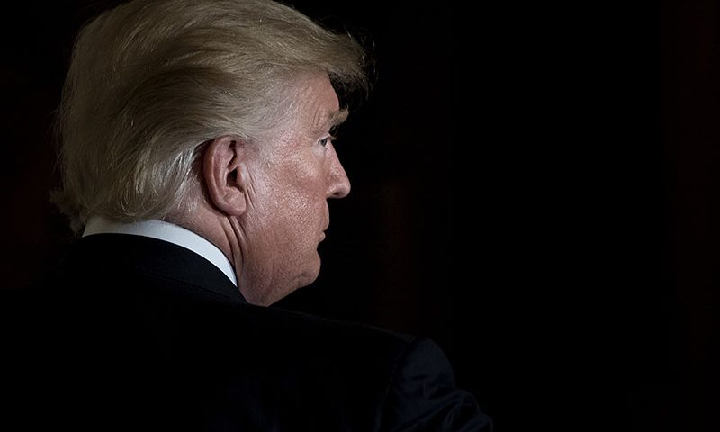 TOPSHOT - US President Donald Trump leaves after a Hispanic Heritage Month event in the East Room of the White House October 6, 2017 in Washington, DC. - President Trump invited over 200 Hispanic business, community, and faith leaders, and guests from across the country to join in the celebration of Hispanic Heritage Month. (Photo by Brendan Smialowski / AFP) (Photo by BRENDAN SMIALOWSKI/AFP via Getty Images)