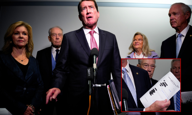 (Background) WASHINGTON, DC - OCTOBER 6: Sen. Bill Hagerty (R-TN) (C), accompanied by (L-R) Sen. Marsha Blackburn (R-TN), Senate Judiciary Committee Chairman Sen. Chuck Grassley (R-IA), Sen. Cynthia Lummis (R-WY), and Sen. Ron Johnson (R-WI), speaks to reporters on Capitol Hill on October 6, 2025 in Washington, DC. Grassley has released a document he says came from a whistleblower, alleging that the FBI subpoenaed the phone records of eight Republican senators during an investigation.(Photo by Andrew Harnik/Getty Images) / (R) WASHINGTON, DC - OCTOBER 6: Sen. Ron Johnson (R-WI) (C), accompanied by (L-R) Sen. Bill Hagerty (R-TN), Sen. Marsha Blackburn (R-TN), Senate Judiciary Committee Chairman Sen. Chuck Grassley (R-IA), Sen. Tommy Tuberville (R-AL), and Sen. Cynthia Lummis (R-WY), holds up documents as he speaks to reporters on Capitol Hill on October 6, 2025 in Washington, DC. Grassley has released a document he says came from a whistleblower, alleging that the FBI subpoenaed the phone records of eight Republican senators during an investigation.(Photo by Andrew Harnik/Getty Images)