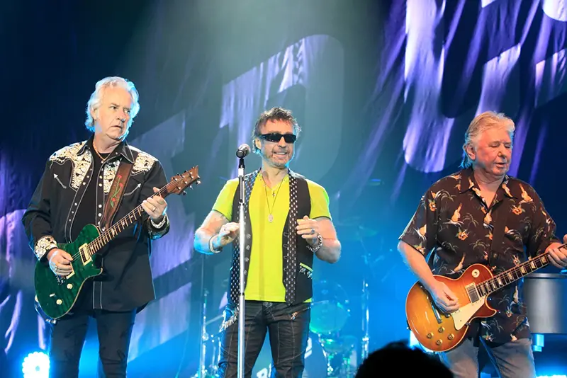 Howard Leese, from left, Paul Rodgers, and Mick Ralphs, of the classic rock band Bad Company, perform in Bethlehem, Pa., on July 29, 2013. (Photo by Owen Sweeney/Invision/AP, File)