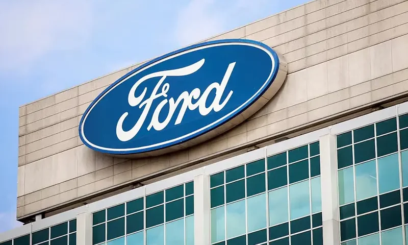 A Ford logo is seen on the Ford Motor World headquarters in Dearborn, Michigan, U.S., March 12, 2025. REUTERS/Rebecca Cook/File Photo