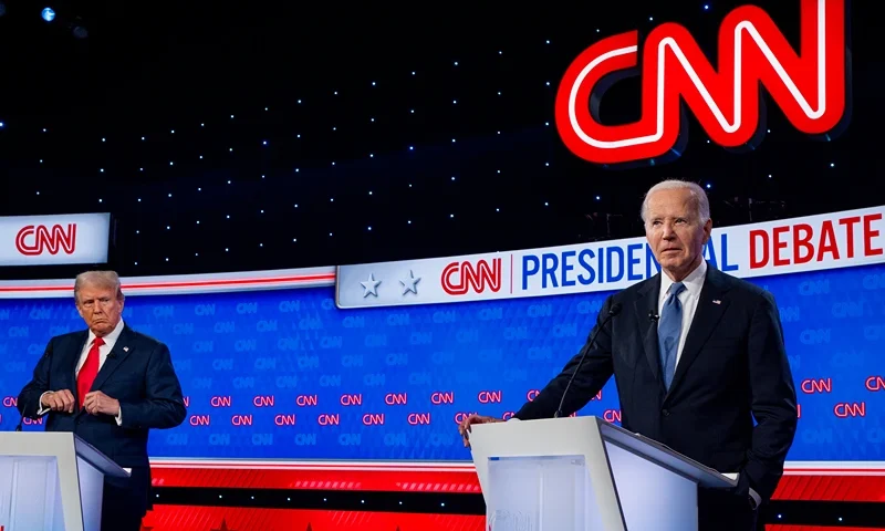 WASHINGTON, DC - JUNE 27: Republican presidential candidate, former President Donald Trump (L) looks at U.S. President Joe Biden during the CNN Presidential Debate at the CNN Studios on June 27, 2024 in Atlanta, Georgia. The debate is the first of two scheduled between the two candidates before the November election. (Photo by Andrew Harnik/Getty Images)