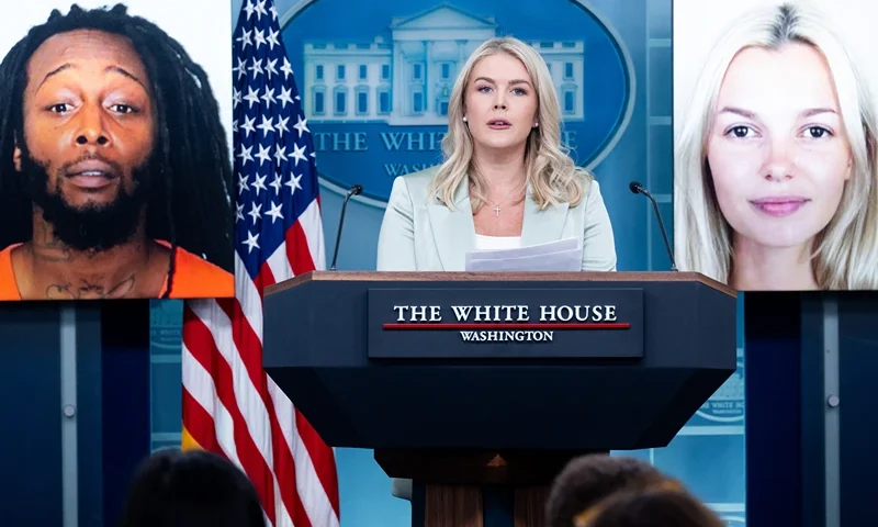 White House Press Secretary Karoline Leavitt speaks alongside a photo of Ukrainian refugee Iryna Zarutska, who was allegedly killed by Decarlos Brown Jr., on a light rail train in Charlotte, North Carolina, during a press briefing in the Brady Press Briefing Room of the White House in Washington, DC, September 9, 2025. (Photo by SAUL LOEB / AFP) (Photo by SAUL LOEB/AFP via Getty Images)