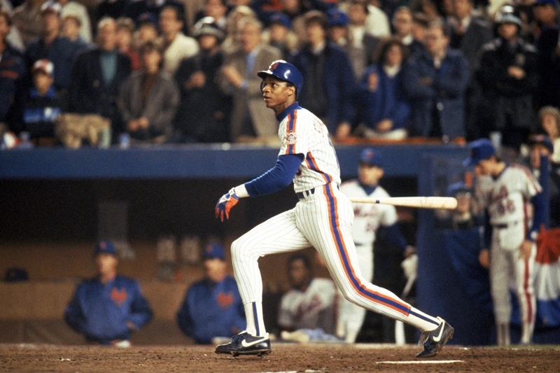 FLUSHING, NY - OCTOBER 27: Right fielder Darryl Strawberry #18 of the New York Mets swings during game 7 of the 1986 World Series against the Boston Red Sox at Shea Stadium on October 27, 1986 in Flushing, New York. The Mets won the series 4-3. (Photo by T.G. Higgins/Getty Images)