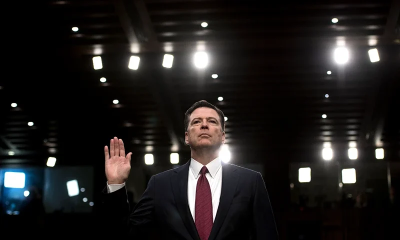 Ousted FBI director James Comey is sworn in during a hearing before the Senate Select Committee on Intelligence on Capitol Hill June 8, 2017 in Washington, DC. Fired FBI director James Comey took the stand Thursday in a crucial Senate hearing, repeating explosive allegations that President Donald Trump badgered him over the highly sensitive investigation Russia's meddling in the 2016 election. (Photo by Brendan Smialowski / AFP) (Photo by BRENDAN SMIALOWSKI/AFP via Getty Images)