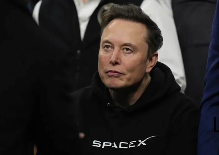 Elon Musk attends the finals for the NCAA wrestling championship, Saturday, March 22, 2025, in Philadelphia. (AP Photo/Matt Rourke, file)