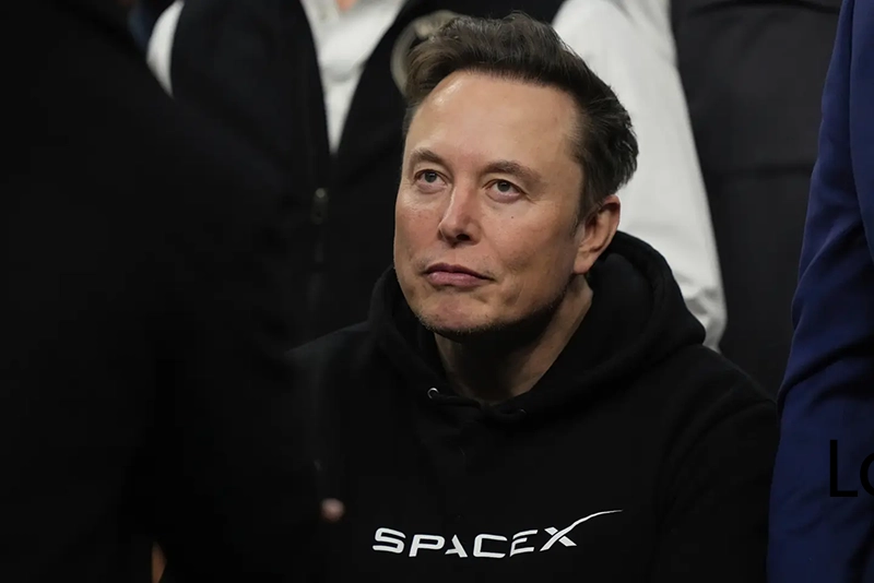 Elon Musk attends the finals for the NCAA wrestling championship, Saturday, March 22, 2025, in Philadelphia. (AP Photo/Matt Rourke, file)